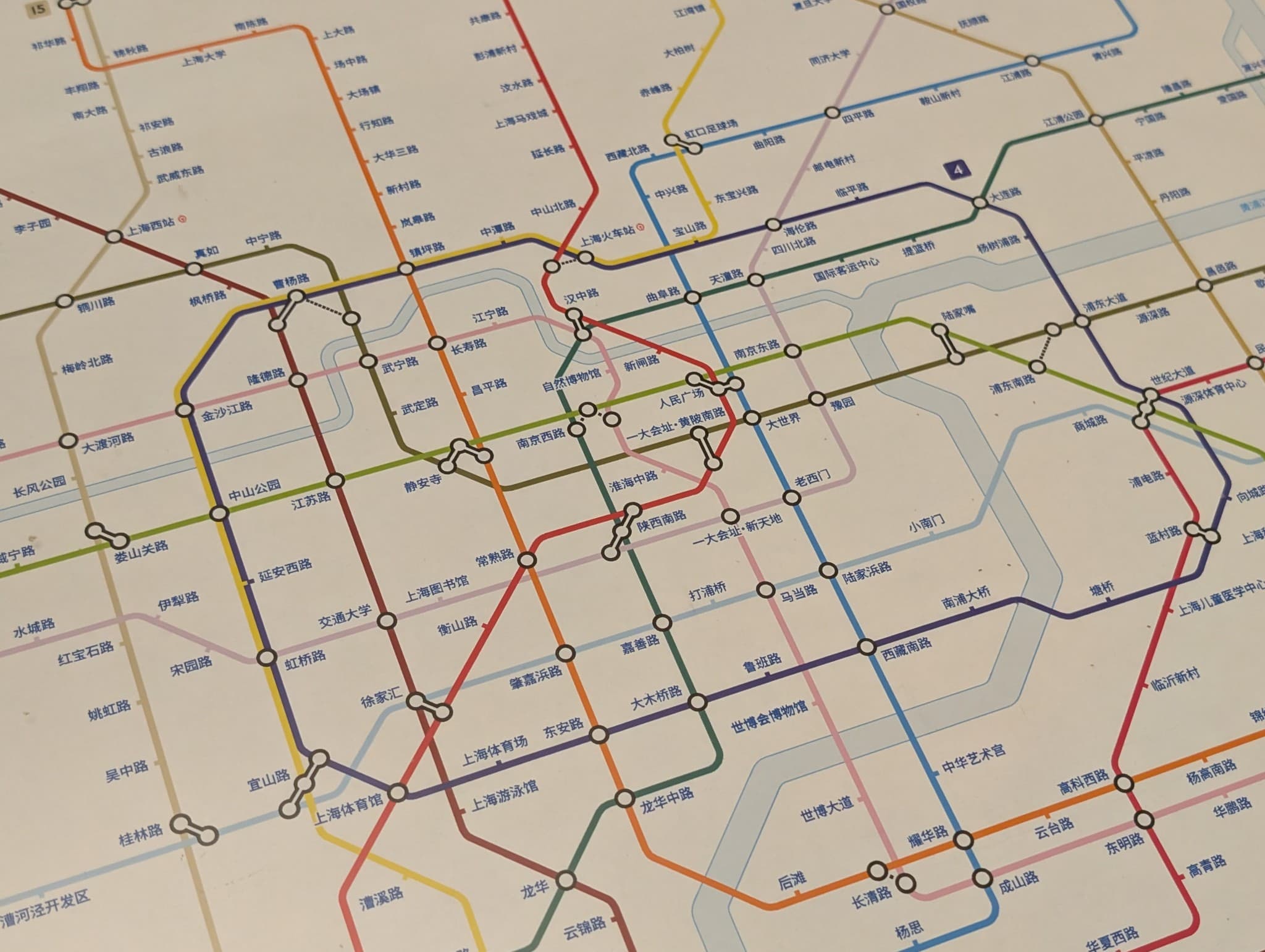 This image shows a section of the Shanghai Metro map featuring intersecting colored lines and Chinese station names.